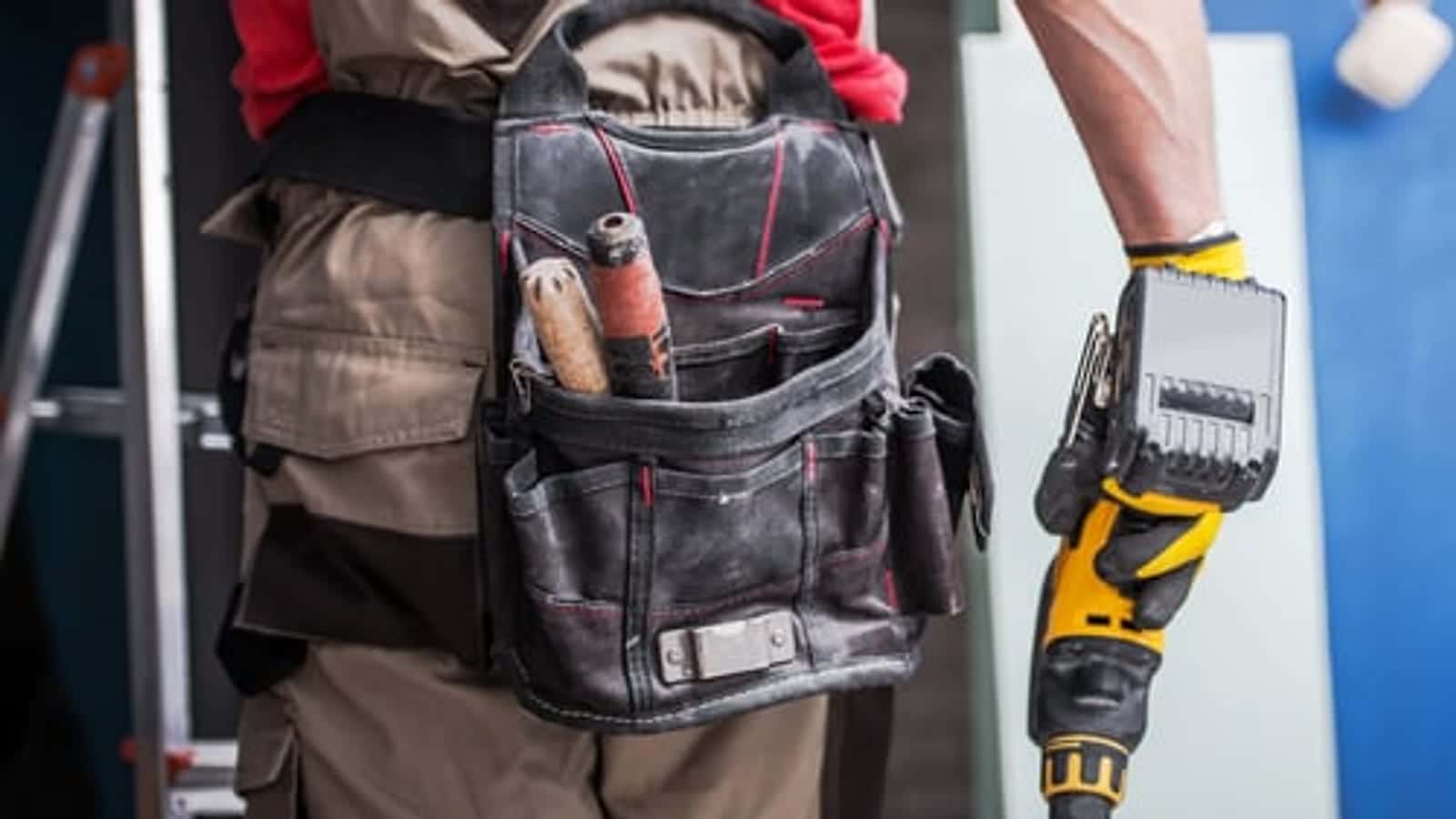 SoHo Home Multiservices home services professional with tool belt in Sanford, Florida