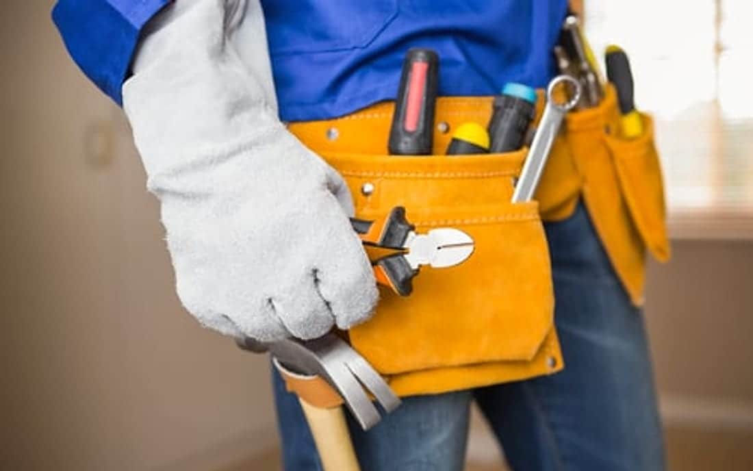 SoHo Home Multiservices handyman wearing a tool belt ready for home repairs in Central Florida